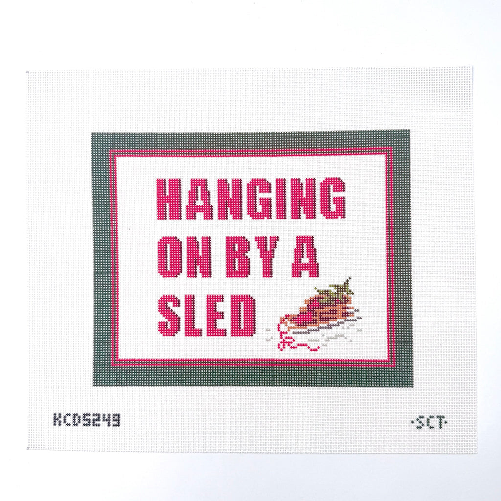 Hanging on by a Sled Printed Canvas